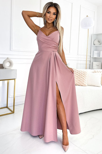 Robe soirée chic rose longue avec fente élégante parfaite pour événements formels ou cocktails.