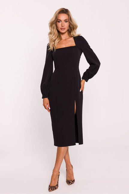 Robe noire soirée chic manches longues midi fendue idéale pour cocktail ou gala.