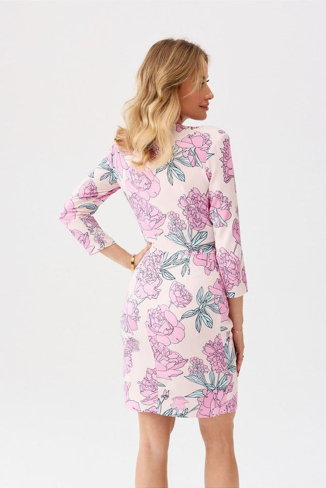 Robe fleurie rose courte chic avec manches longues pour cocktail ou soirée, parfaite pour une allure élégante et printanière.