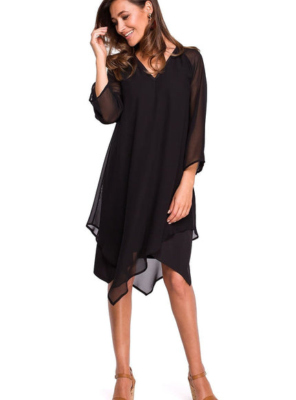 Robe soirée noire midi asymétrique élégante pour cocktail avec manches courtes et encolure dégagée pour une allure chic et moderne.