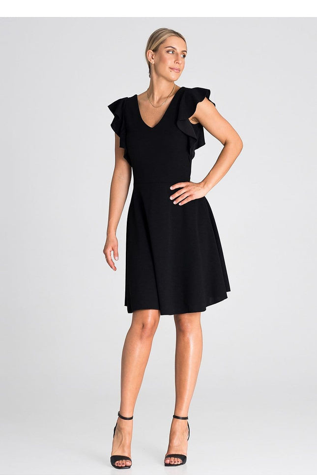 Robe noire soirée chic midi évasée avec manches courtes, idéale pour cocktail ou gala, silhouette élégante et féminine.