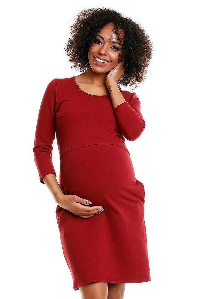 Robe de grossesse chic rouge midi manches longues pour femme enceinte, idéale pour cocktail ou événement.