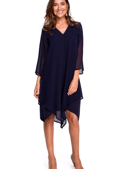 Robe soirée chic bleue midi à manches longues, fluide et élégante pour cocktail et événements.