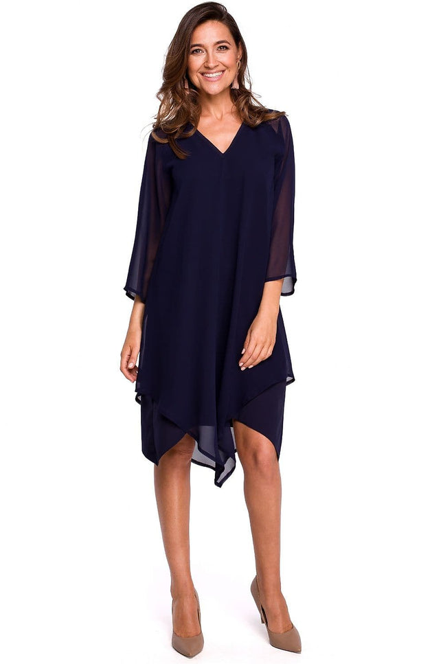 Robe soirée chic bleue midi à manches longues, fluide et élégante pour cocktail et événements.