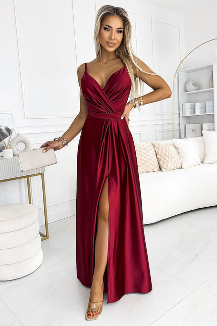 Robe soirée chic longue rouge avec fente, idéale pour un gala ou un événement formel.