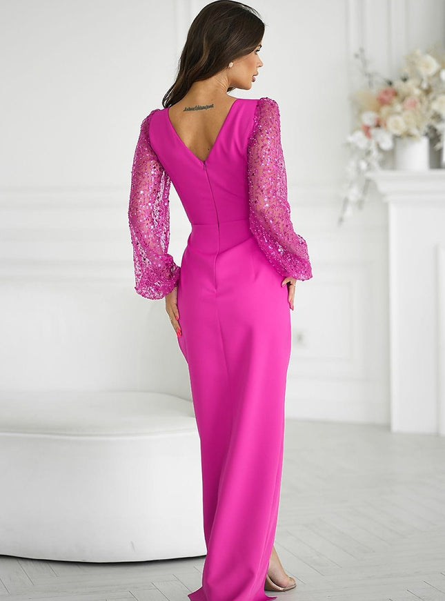 Robe rose longue élégante avec manches longues et paillettes pour soirée ou mariage.