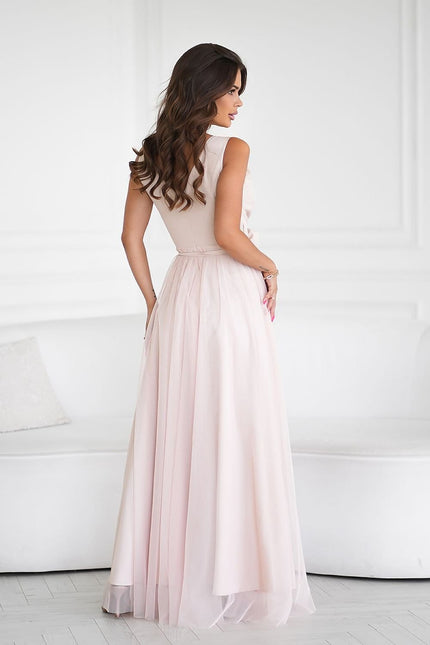 Robe rose longue fluide sans manches pour mariage invité chic ou bal d'été, style princesse.