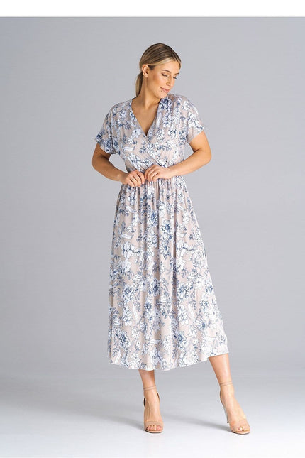 Robe fleurie midi chic blanche, idéale pour cocktail ou soirée, avec manches courtes et silhouette trapèze.