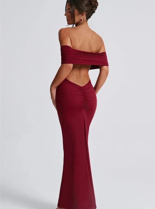 Robe soirée dos nu bordeaux longue moulante sans manches pour gala ou mariage invité chic.