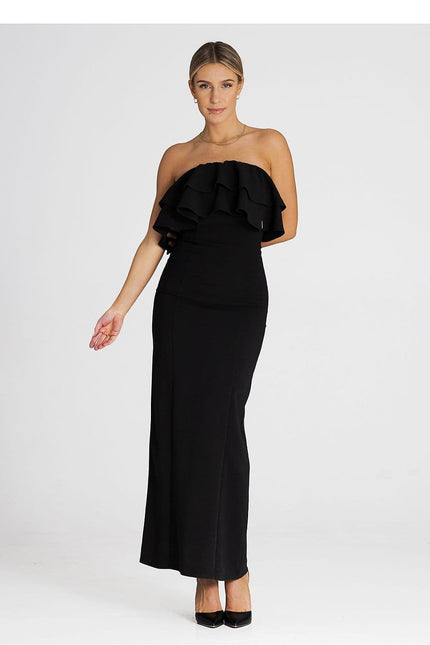 Robe noire longue soirée chic avec épaules dénudées pour cocktail, gala ou événement formel.