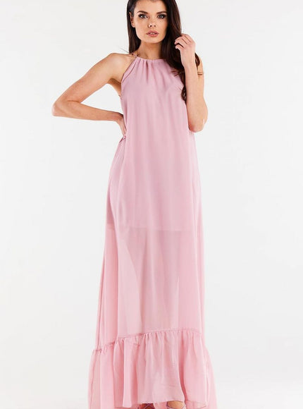 Robe rose longue fluide sans manches pour soirée élégante, avec détail de ruché au bas, parfaite pour cocktail ou gala.