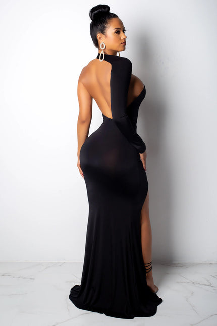 Robe de soirée sexy dos nu noire longue moulante avec manches longues, idéale pour gala élégant.