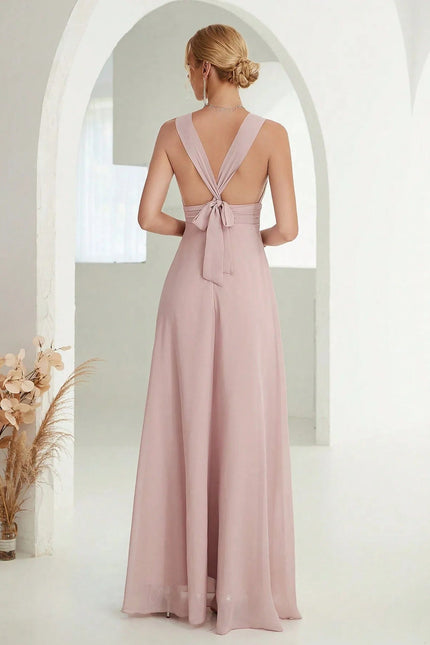 Robe demoiselle d'honneur beige crème longue avec dos croisé et nœud, élégante pour mariage, silhouette trapèze.