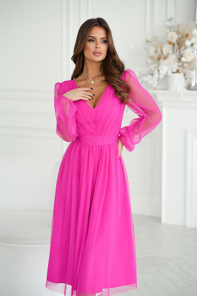 Robe rose chic midi soirée manches longues pour un évènement élégant ou cocktail, idéale pour une allure sophistiquée.