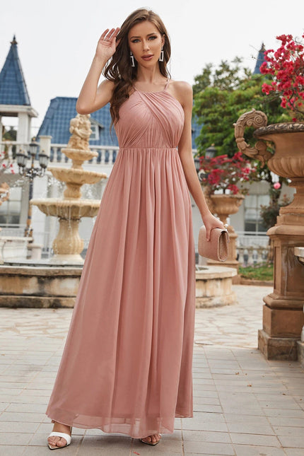 Robe demoiselle d'honneur rose poudré longue sans manches style bohème chic pour mariage.