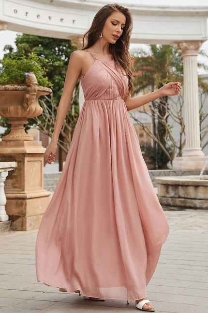 Robe demoiselle d'honneur rose poudré longue sans manches style bohème chic pour mariage.