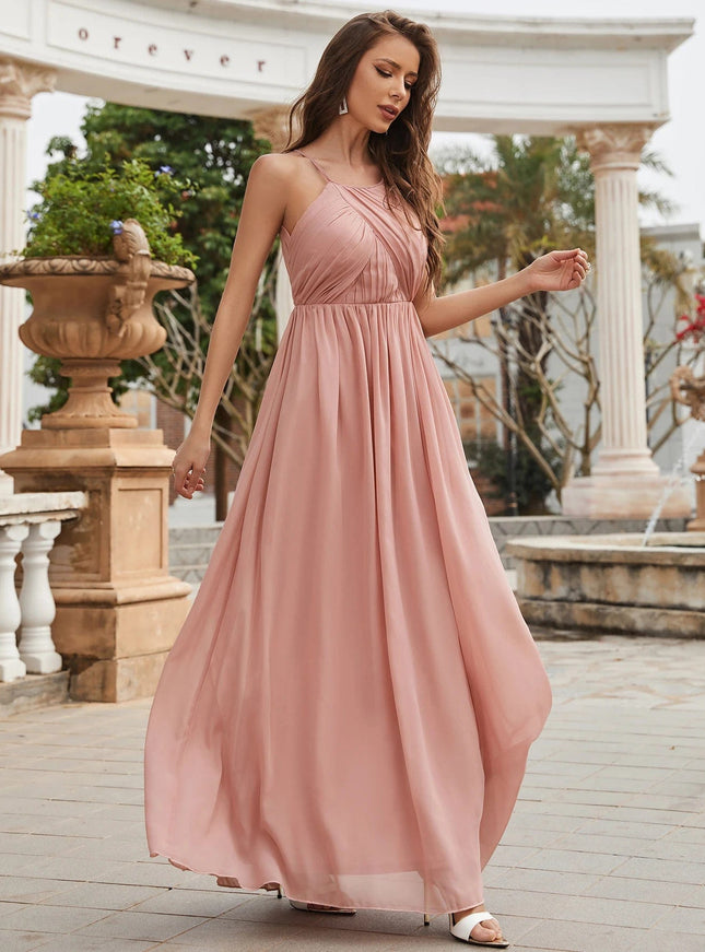 Robe demoiselle d'honneur rose poudré longue sans manches style bohème chic pour mariage.