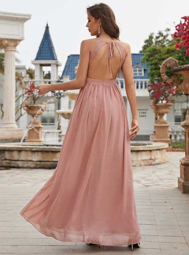 Robe demoiselle d'honneur rose poudré longue dos nu sans manches élégante pour mariage, style bohème chic.