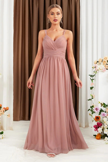 Robe demoiselle d'honneur longue rose poudré avec dos nu, idéale pour mariage chic et élégante.