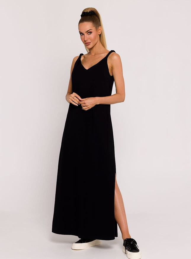 Robe soirée noire longue simple sans manches pour femme élégante, idéale pour événements sobres et chics.