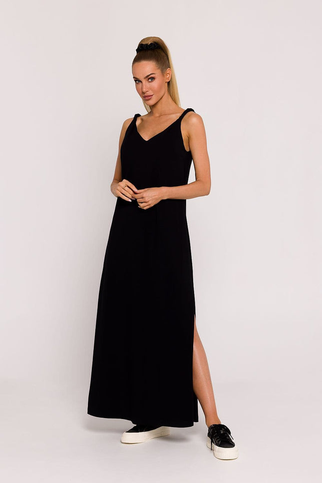 Robe soirée noire longue simple sans manches pour femme élégante, idéale pour événements sobres et chics.