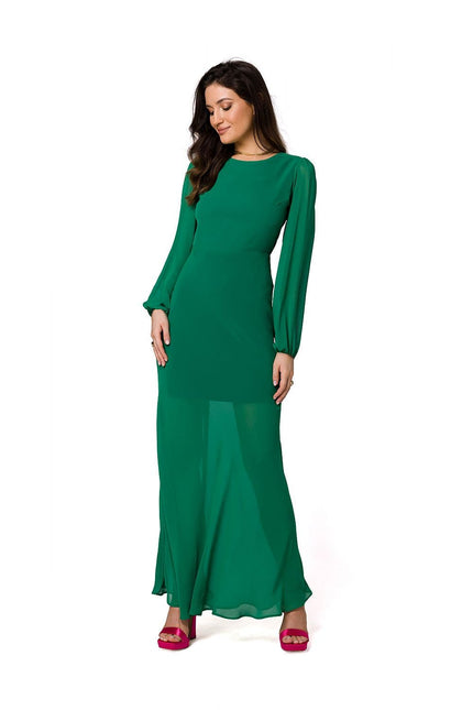 Robe de soirée verte élégante, longue avec manches longues, idéale pour cocktail ou événement chic.