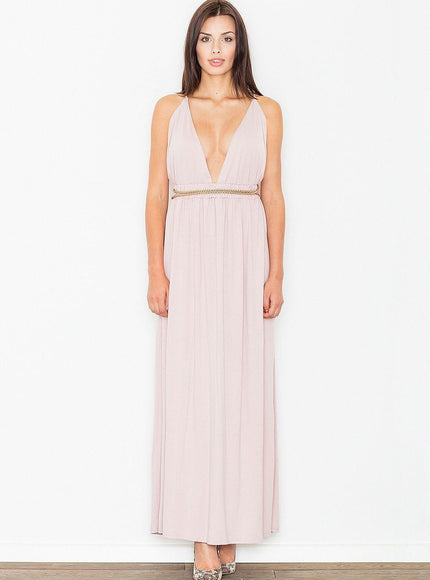 Robe soirée chic rose longue sans manches pour mariage invité avec décolleté et ceinture brillante.