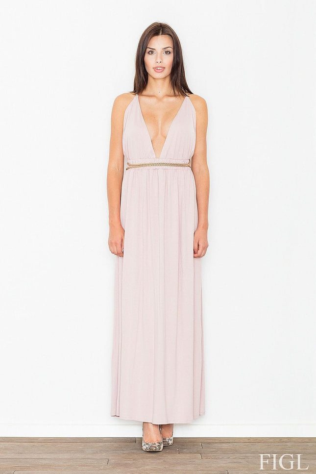 Robe soirée chic rose longue sans manches pour mariage invité avec décolleté et ceinture brillante.