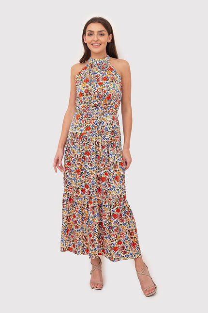 Robe d'été fleurie longue sans manches style bohème idéale pour une journée plage ou une soirée casual.