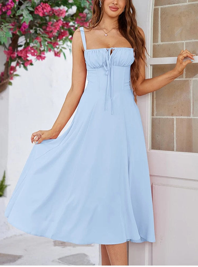 Robe été bohème bleue longue évasée sans manches pour un look chic et décontracté.