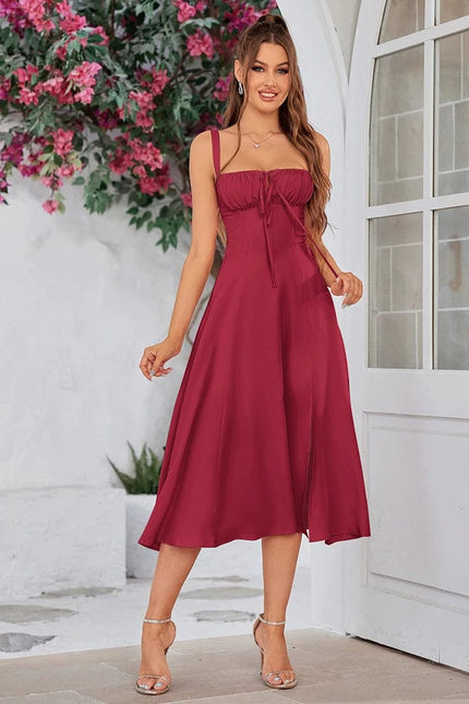 Robe été chic bordeaux midi fluide femme sans manches, idéale pour une soirée élégante.