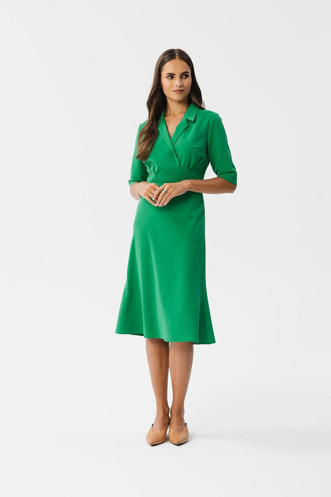 Robe verte chic midi à manches longues idéale pour cocktail ou soirée d'entreprise, élégante et tendance pour une silhouette sophistiquée.