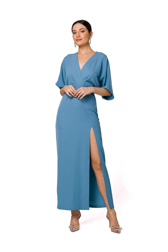 Robe bleue soirée chic longue, coupe droite avec manches courtes et fente latérale, parfaite pour gala ou cocktail.