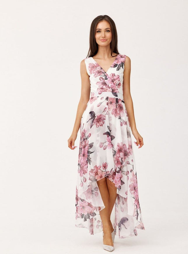 Robe fleurie asymétrique midi pour mariage invité chic, sans manches avec un motif floral rose sur fond blanc.