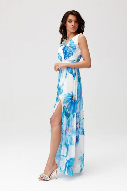 Robe fleurie bleue longue d'été sans manches à silhouette trapèze, idéale pour mariage bohème ou soirée chic en bord de plage.