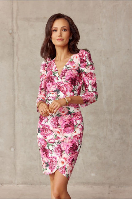 Robe fleurie chic midi à manches longues idéale pour un cocktail ou événement printanier.