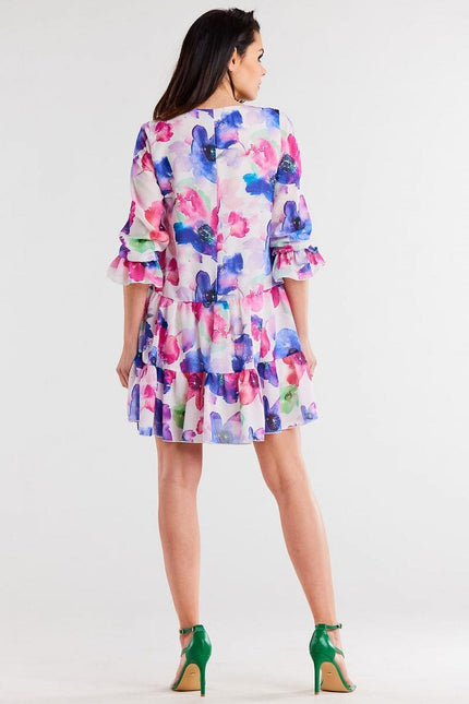 Robe florale courte avec manches longues pour cocktail ou soirée, couleur vive et style décontracté.