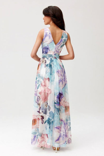 Robe fleurie longue d'été, silhouette princesse, sans manches, parfaite pour soirée, mariage ou gala, en tissu léger et coloré.