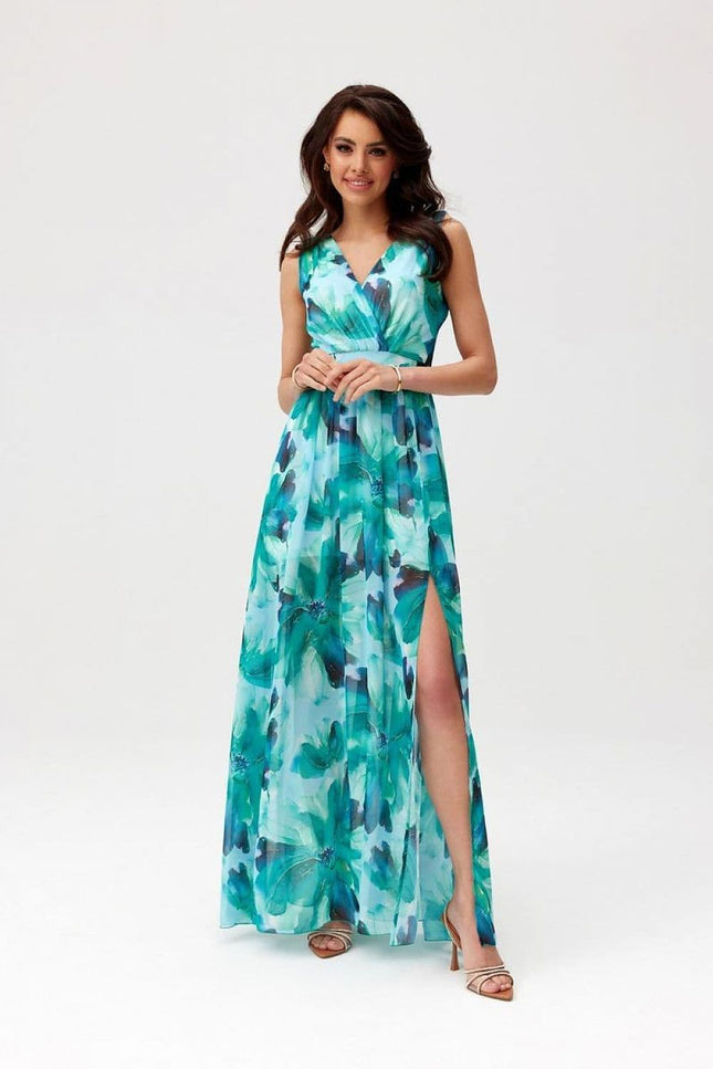 Robe soirée fleurie longue verte sans manches, col V pour cocktail d'été ou mariage, style fluide et élégant.