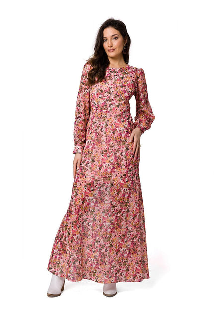 Robe longue fleurie à manches longues pour cocktail et soirée chic de couleur rose.