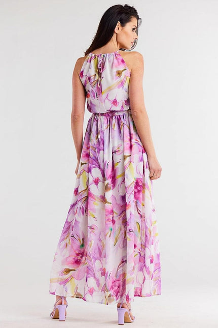 Robe de soirée fleurie longue sans manches en rose et violet pour cocktail ou mariage, élégante et tendance.