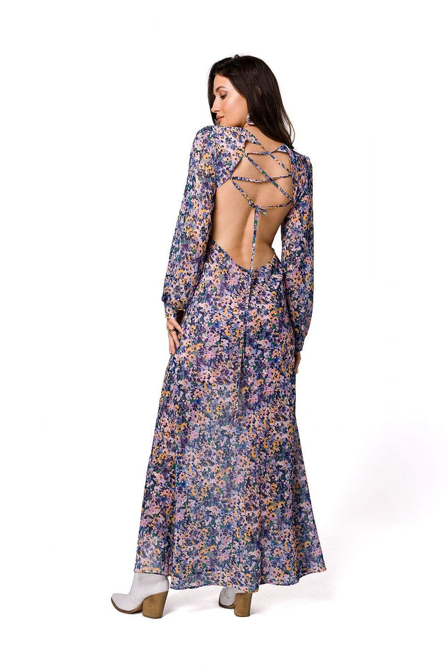 Robe fleurie longue à manche longue et dos nu, idéale pour une soirée ou un mariage champêtre.