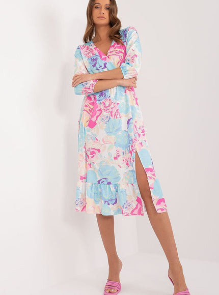 Robe fleurie d'été midi à manches longues, idéale pour un look bohème chic lors d'événements décontractés ou de soirées simples.