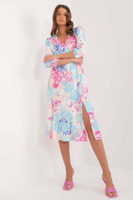 Robe fleurie d'été midi à manches longues, idéale pour un look bohème chic lors d'événements décontractés ou de soirées simples.