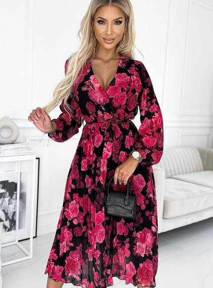 Robe fleurie midi manches longues noire et rose pour cocktail ou soirée élégante, style bohème chic.