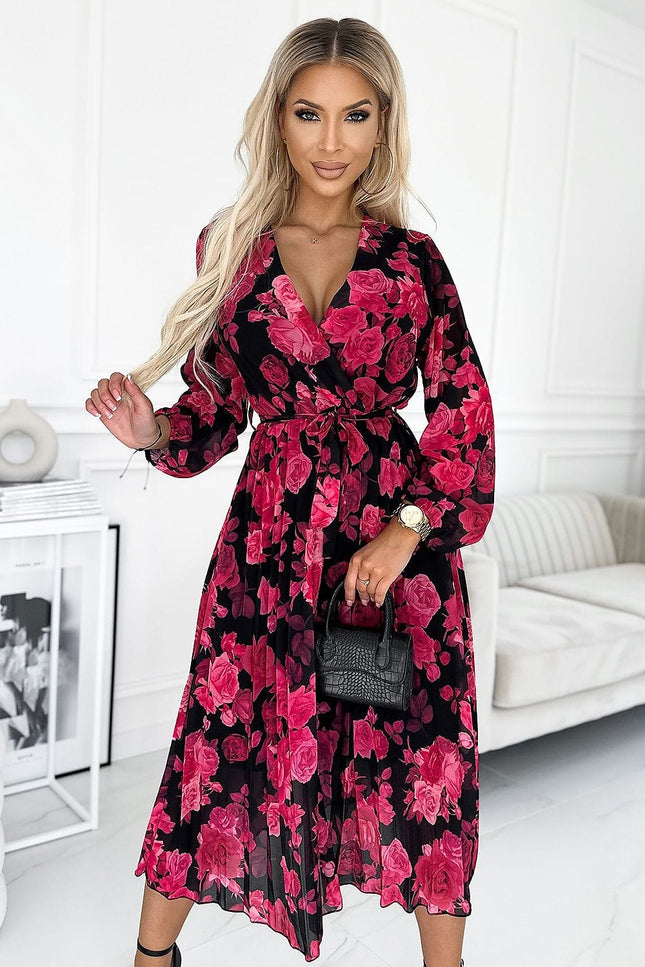 Robe fleurie midi manches longues noire et rose pour cocktail ou soirée élégante, style bohème chic.