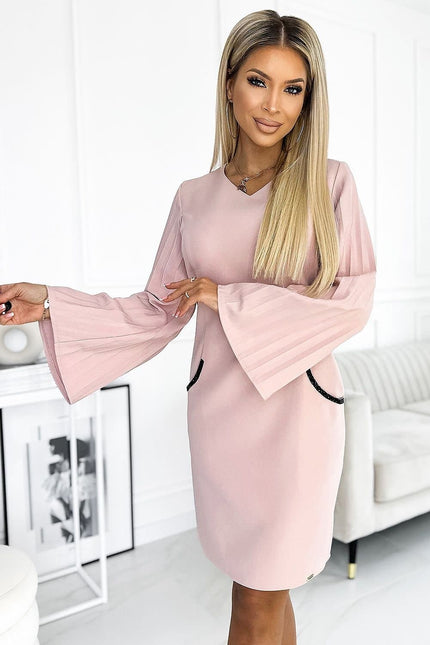 Robe soirée rose manches longues midi élégante et chic parfaite pour cocktail ou événement formel.