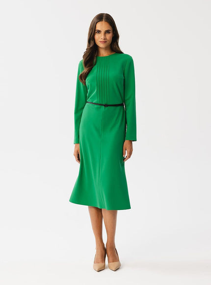 Robe verte chic midi à manches longues idéale pour cocktail ou évènement professionnel.