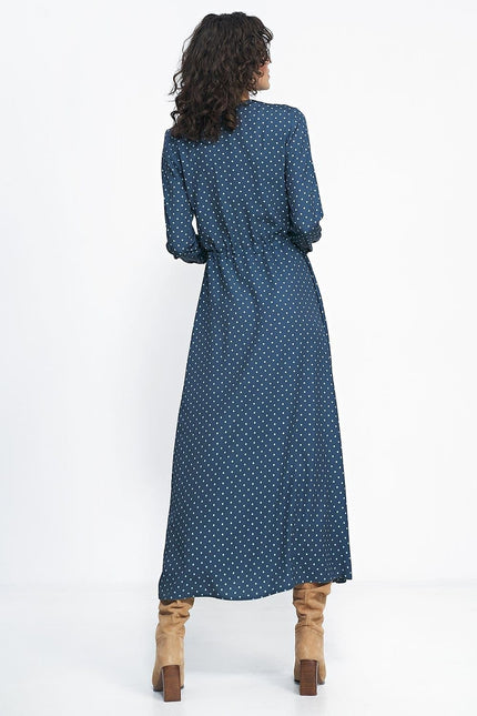 Robe longue bleue à pois blancs, manches longues, style décontracté, parfaite pour soirée simple ou cocktail.