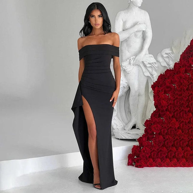 Robe noire longue fendue soirée chic avec épaules dénudées pour gala ou cocktail, silhouette moulante et élégante.